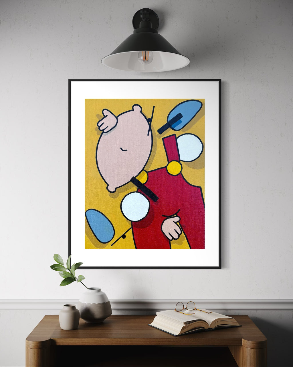 Mockup Photo - Deconstructed pop art print of Stewie Griffin in yellow and red tones by Stimuleye Arts.
