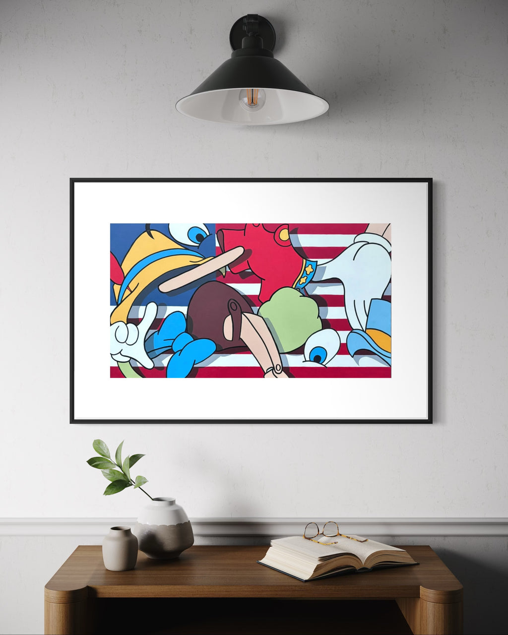 Framed colorful abstract artwork on a wall above a wooden table with decor items.